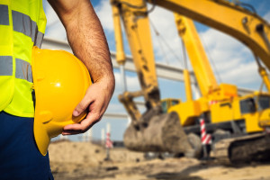 Construction worker with machinery