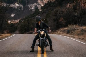 man riding motorcycle