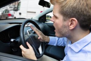 Angry driver pressing horn