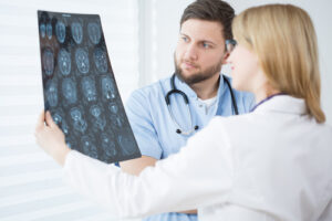 Radiologist teaching results to patient