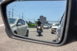 reflection of motorcycle on left side mirror